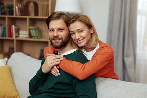 Romantic Couple Embracing Sofa Happy Couple Relaxing On Couch At Home