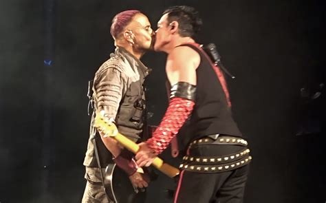 rammstein share same sex kiss on stage in russia to