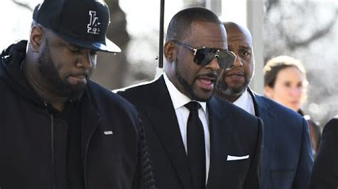prosecutors charge three of r kelly s friends for