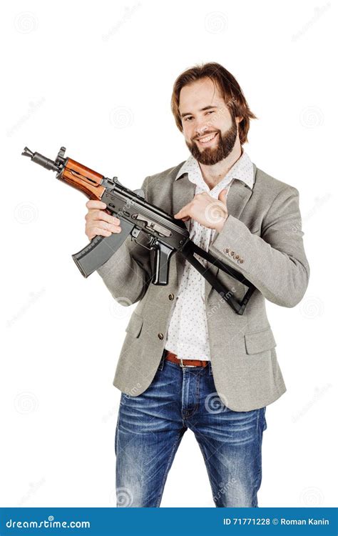 man holding  machine gun isolated  white background stock photo