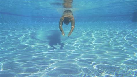 swimming underwater in a pool free stock video