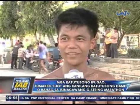 mga katutubong ifugao tumakbo suot ang kanilang katutubong damit na bahag sa  string marathon