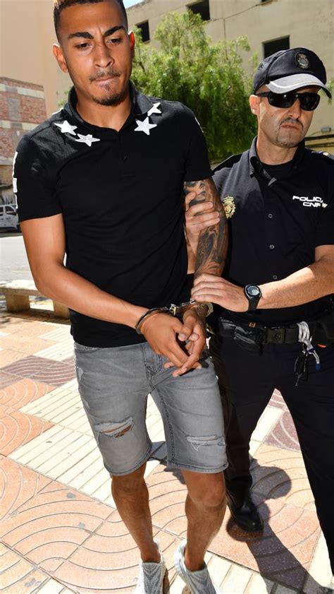 charlton athletic footballers arrive at ibiza court in handcuffs over