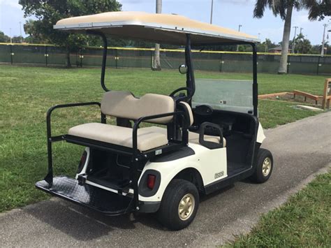 white  gas ezgo rxv  passenger flip seat golf cart extended canopy lights