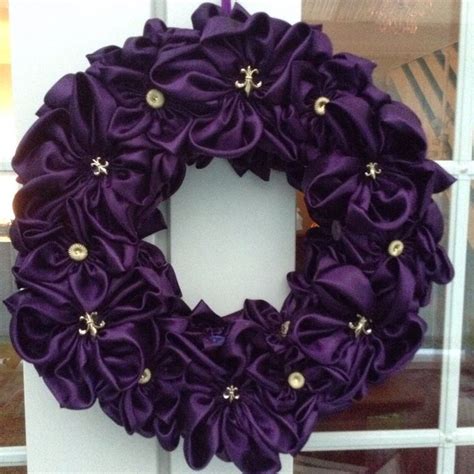purple satin flower wreath with purple and gold buttons satin flowers