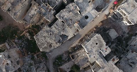 flight   drone   city  homs  syria stock footagecitydroneflighthoms city