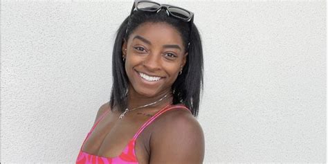 Simone Biles And Her 6 Pack Are Literally Glowing In Her