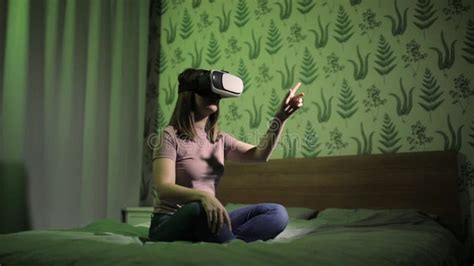 Woman In Bed In Virtual Reality 3d Glasses Learning Something Side