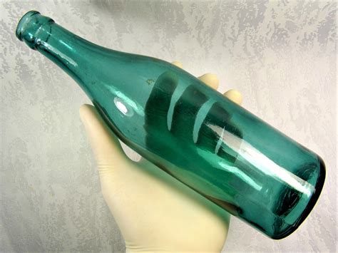 vintage green glass bottle  millilitres retro antique etsy