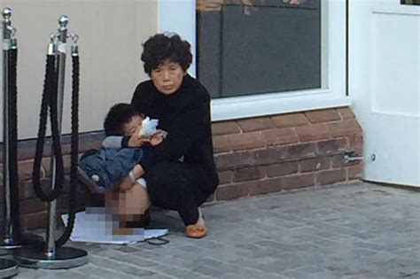 Chinese Tourist Caught Doing Poo Right Outside British