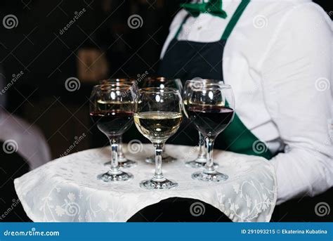 waiter serves few glasses of red and white wine stock image image of