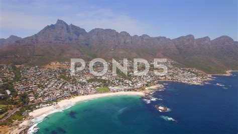 aerial travel drone view  camps bay beach cape town south africa stock footage ad view