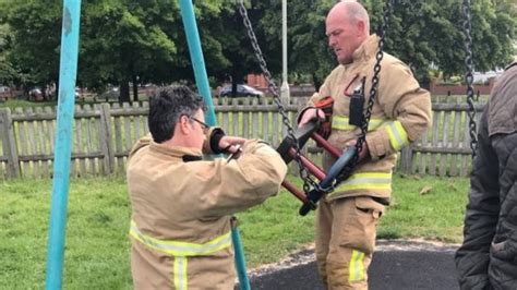 firefighters rescue man 20 stuck for hours in swing bbc news