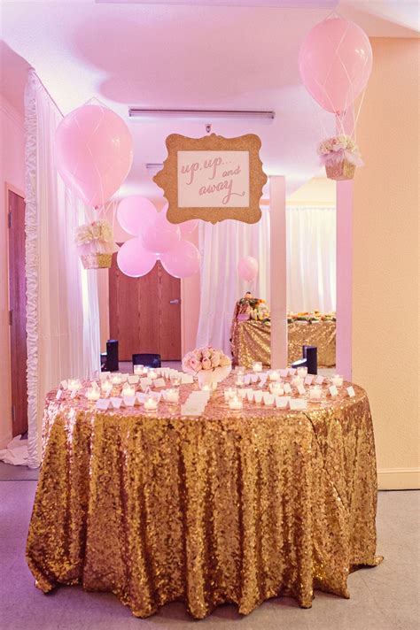 a glittering pink and gold hot air balloon themed birthday