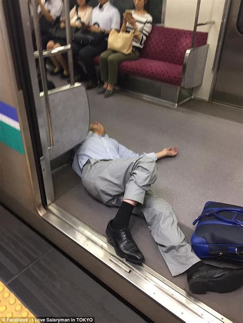 drunk japanese businessmen caught legless on metro daily mail online