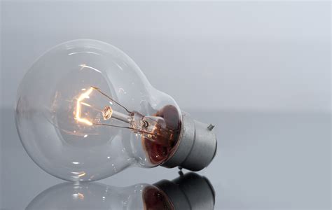 image  clear light bulb  glowing filament freebiephotography