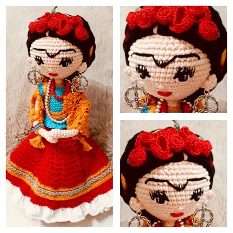 crocheted doll  wearing  red  white dress  flowers   hair