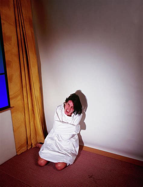 Psychiatric Patient In A Strait Jacket Screaming Photograph By Cc