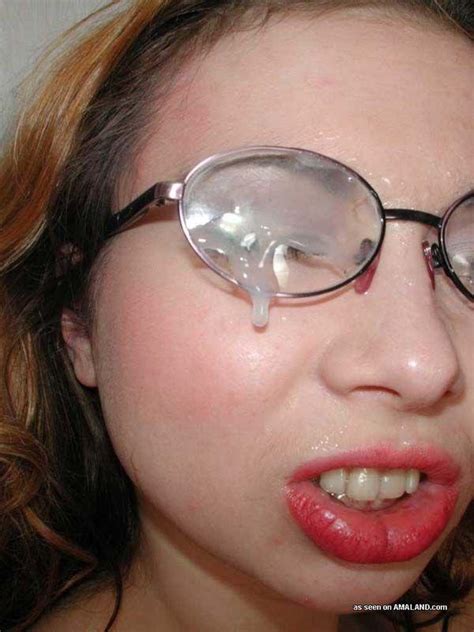 pictures of a hot girlfriend in glasses getting covered in jizz