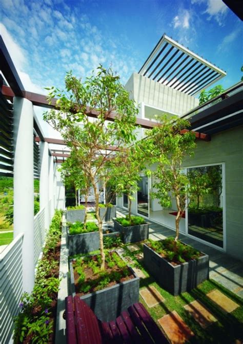 tropical house design  cool rooftop garden  canopy setia eco park villa  tws