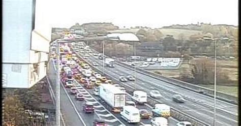 live m25 a405 traffic chaos as crash and diesel spillage causes ten miles of queues near m1
