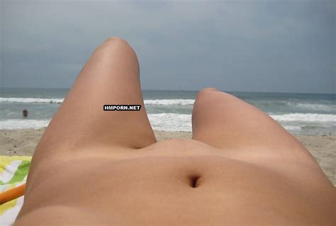 beautiful nymphs sunbathing naked on the beach