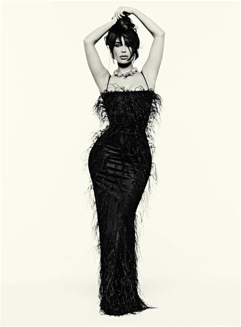 kim kardashian s steamy photo shoot reveals her boobs in vogue magazine