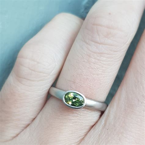 flat court oval green sapphire platinum ring jacks turner clifton rocks