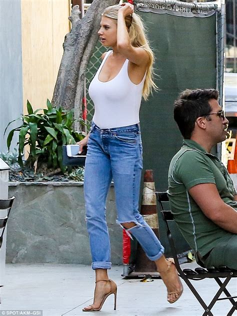 charlotte mckinney shows off her famous curves on a shopping trip
