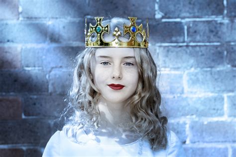 woman wearing crown stock photo