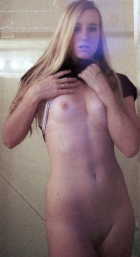 sexy blonde teen amateur flashes her tit in the mirror