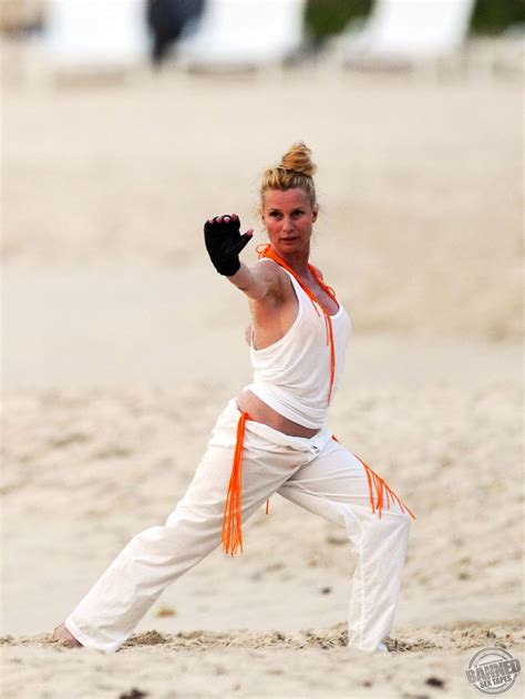 nicollette sheridan caught training in wet bikini on a beach tattoos for girls