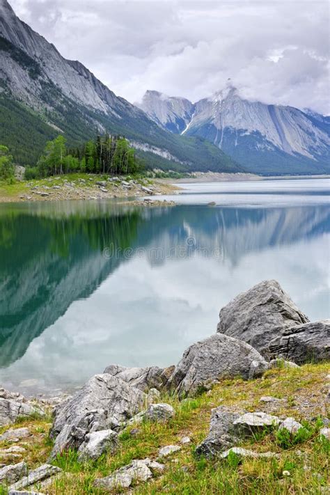 mountain lake  jasper national park stock image image  reflecting