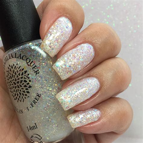 white iridescent full coverage glitter nail polish lacquer