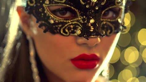 sexy woman wearing venetian masquerade carnival mask at