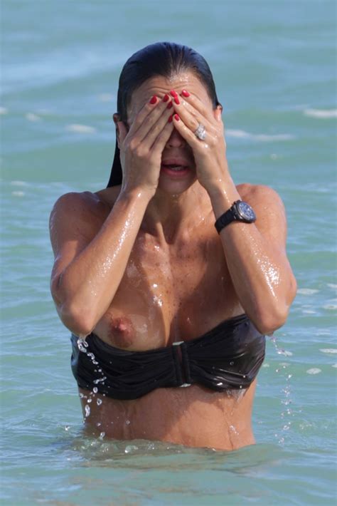claudia galanti bikini double boob slip and nipple slip again and again in miami sexmenu