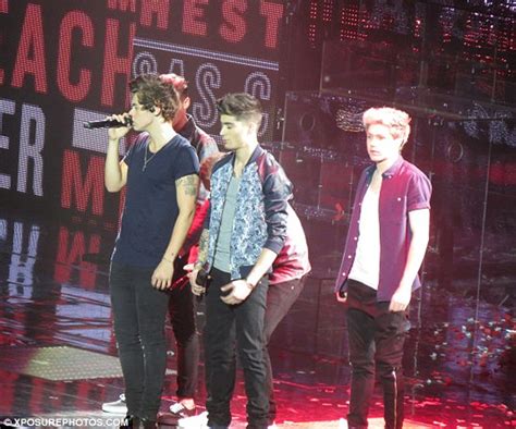 harry styles flashes audience as liam payne pulls down his trousers at one direction s o2