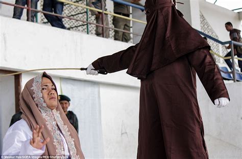 suspected prostitutes caned during mass flogging that leaves man s back
