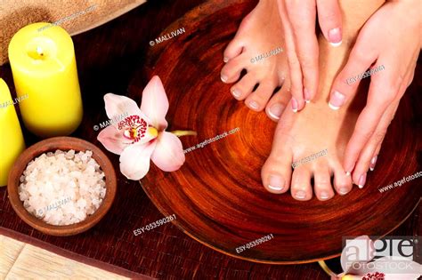 spa treatment  product  female feet spa thailand stock photo