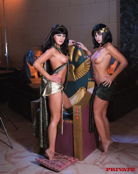 egyptian princess pose her steaming hot body and lusty boobs in silver and gold dress with cape