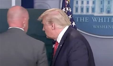 trump gets escorted out of briefing room after secret service shoot man