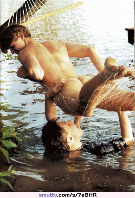 gay blowjob hot twink cocksucker outdoor male cocksucking hammock water wet