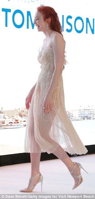 Eleanor Tomlinson Stuns In Glittering Nude Gown In London