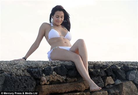 chloe goodman shows off her curves in white embellished bikini daily mail online