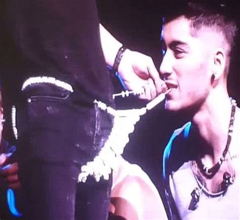 Video Watch One Direction S Zayn Malik Eat Harry Styles Thong On