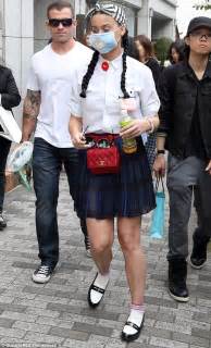 Katy Perry Conceals Herself With A Fluffy Face Mask In Japan Daily