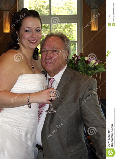 bride with her dad after marriage ceremony royalty free stock images image 32313189