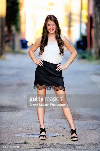 beautiful smiling teen strikes a sassy pose photo getty images
