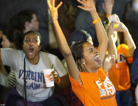 virginias fans    streets  celebrate  overtime ncaa victory  texas tech