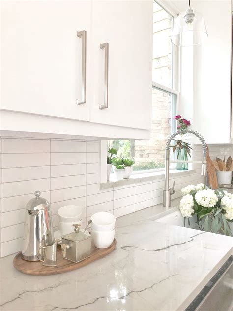 kitchen design quick tip   transition finishes   kitchen sink window designed
